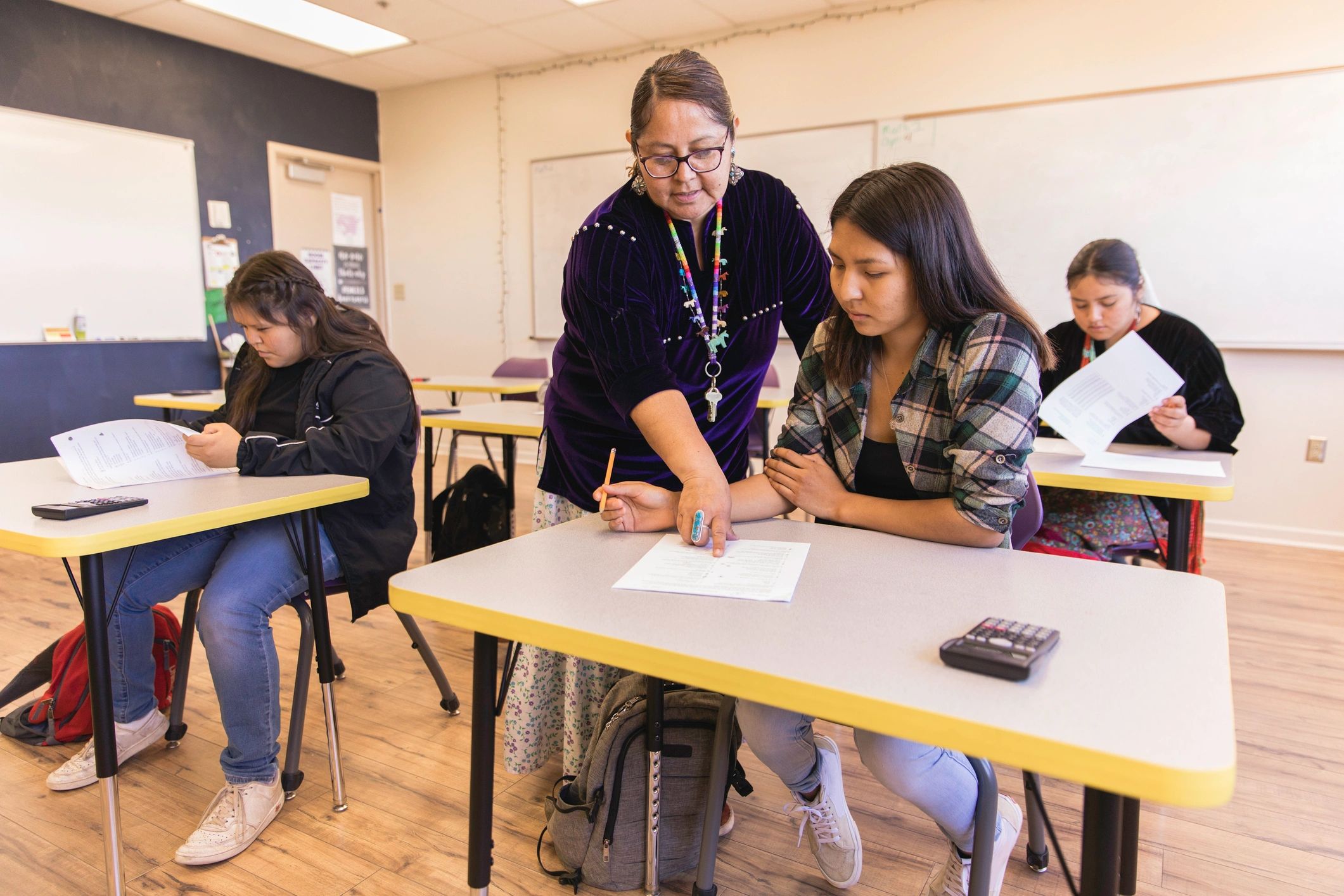 Teacher leading a middle school classroom lesson